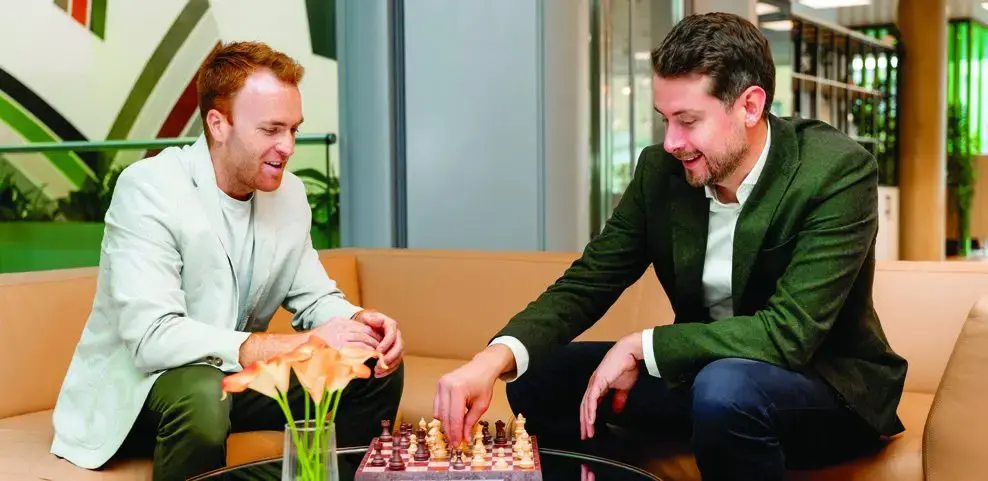 Two Oaklin colleagues playing chess