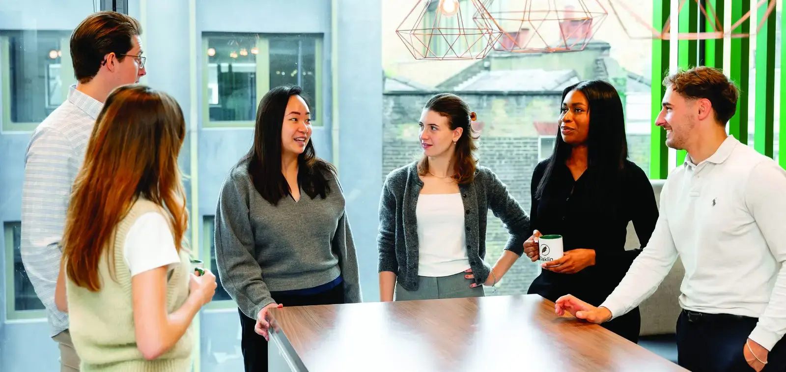 A group of Oaklin colleagues in the office
