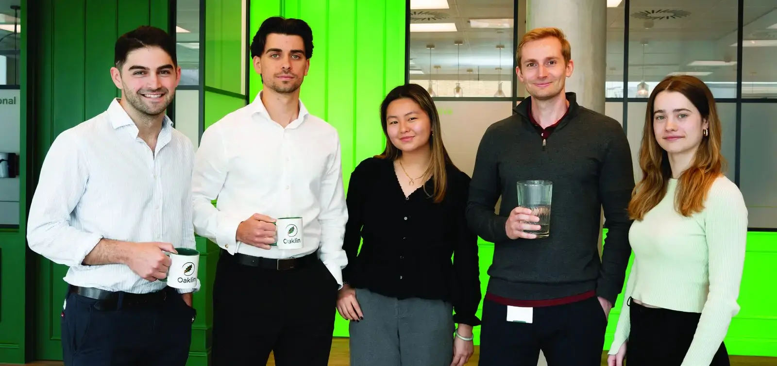 Oaklin colleagues together in the office