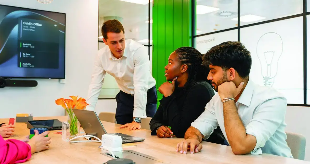 Oaklin colleagues in a meeting